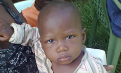 Photo of hungry child helped by IIMSAM