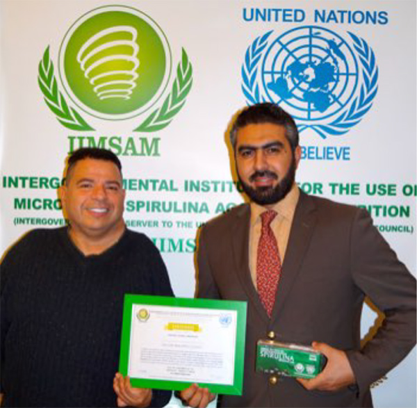 H.E. Mr. Mohamed Elsayed F. Saad receiving Goodwill Ambassador Credential Certificate from Secretary General R. Maradona